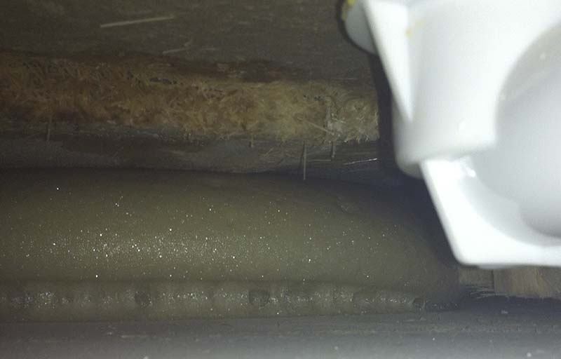 Foam support under tub floor